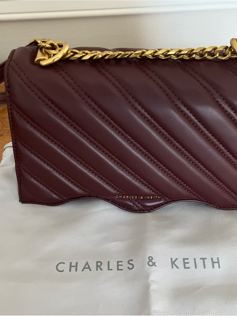Charles & Keith Quilted Crossbody Bag in Deep Burgundy with Gold Chain - Picture 3 of 3
